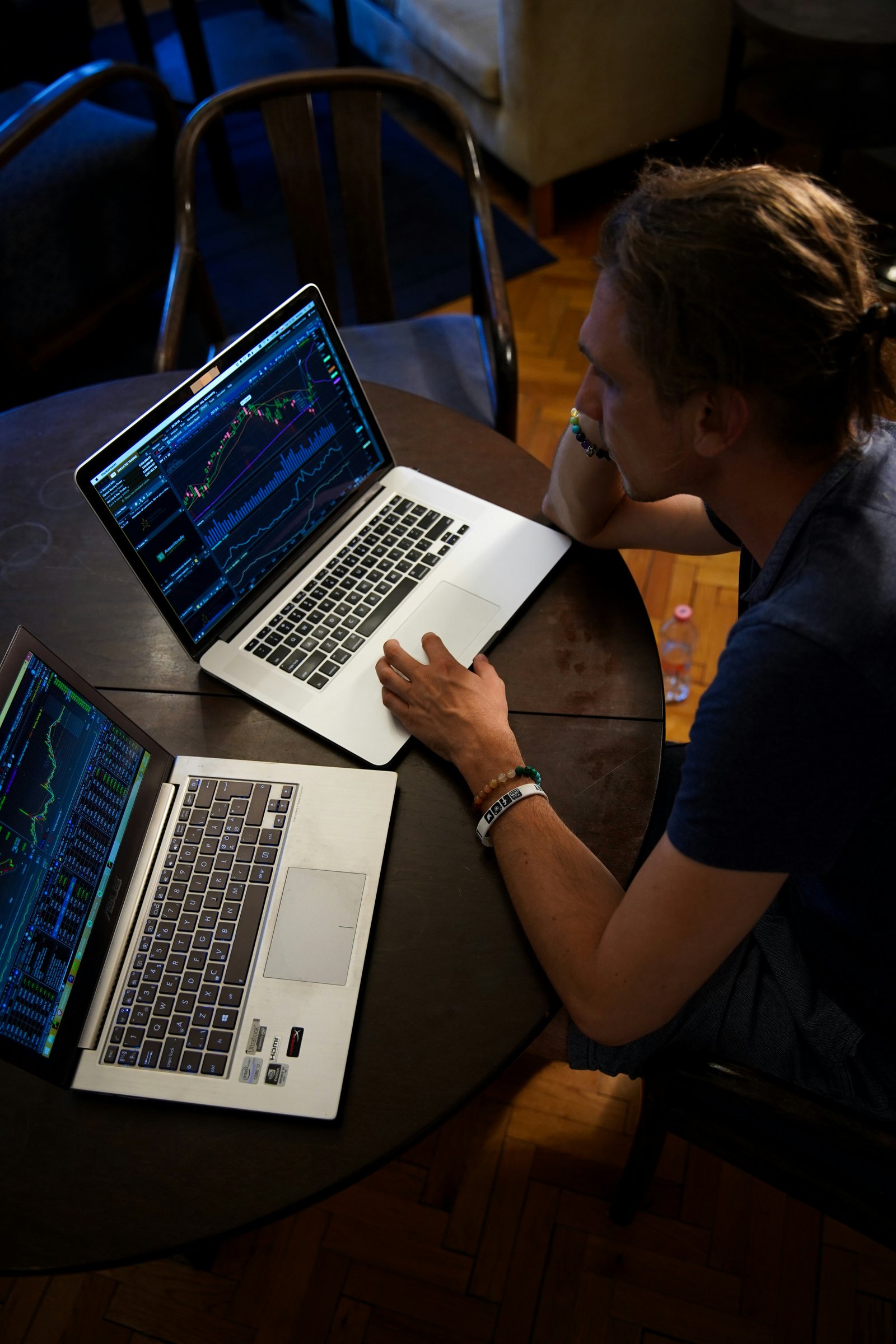 Analyst reviewing SEC Form 4 filings on dual monitors